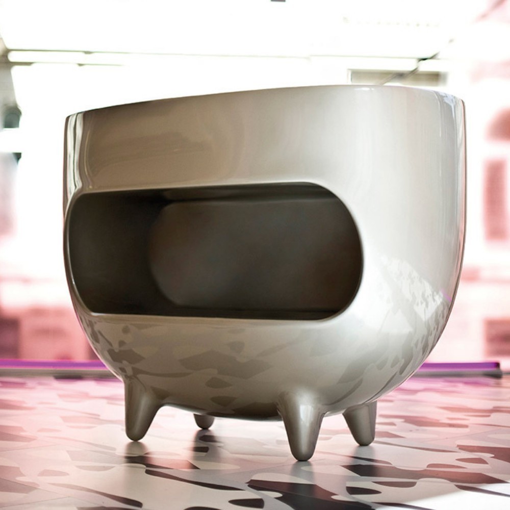 SPLAY display counter with storage compartment designed by Karim Rashid